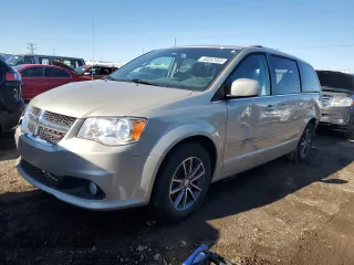 2016 Dodge Grand Caravan SXT with VIN 2C4RDGCG5GR219517, listed as a Copart auction lot 50052405 with 104,552 mi miles and Salvage Title. Bid and sale history available at DreamBid. Image 1.