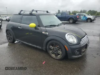 2013 MINI Hardtop z VIN WMWSU3C56DT689582, wystawiony jako Copart lot #58364685 z przebiegiem Nie podano mil oraz Szkoda całkowita • Salvage title. Historia ofert i sprzedaży dostępna na DreamBid. Obrazek 4.