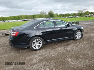 2016 Ford Taurus Limited with VIN 1FAHP2F81GG113129, listed as a Copart auction lot 55770045 with 104,778 mi miles and Salvage title. Bid and sale history available at DreamBid. Image 3.