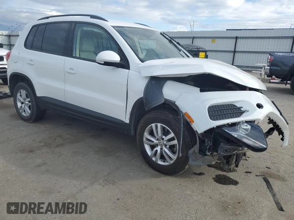 2017 Volkswagen Tiguan S with VIN WVGAV7AX9HK017871, listed as a Copart auction lot 48767785 with 49,608 mi miles and Salvage Title. Bid and sale history available at DreamBid. Image 4.