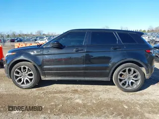 2015 Land Rover Range Rover Evoque Dynamic with VIN SALVT2BG9FH975389, listed as a IAAI auction lot 41803460 with 134,567 mi miles. Bid and sale history available at carsss.com. Image 14.