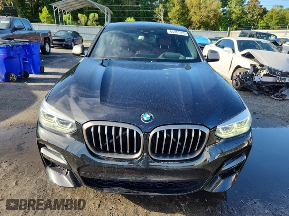 2021 BMW X4 M40i with VIN 5UX2V5C05M9F68427, listed as a Copart auction lot 64941095 with 50,208 mi miles and Salvage title. Bid and sale history available at DreamBid. Image 5.