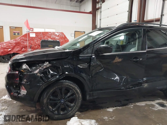 2018 Ford Escape SE with VIN 1FMCU9GD7JUD36295, listed as a IAAI auction lot 41855037 with 85,305 mi miles. Bid and sale history available at carsss.com. Image 21.