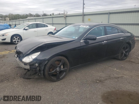 2009 Mercedes-Benz CLS-Class 5.5L with VIN WDDDJ72X99A142572, listed as a Copart auction lot 52297195 with 87,520 mi miles and Salvage Title. Bid and sale history available at carsss.com. Image 1.