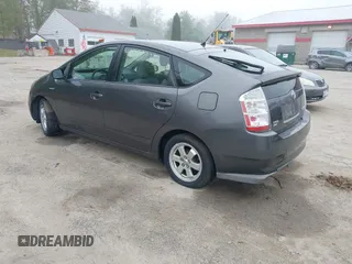 2007 Toyota Prius z VIN JTDKB20U473285795, wystawiony jako IAAI lot #42280703 z przebiegiem Nie podano mil oraz . Historia ofert i sprzedaży dostępna na DreamBid. Obrazek 3.