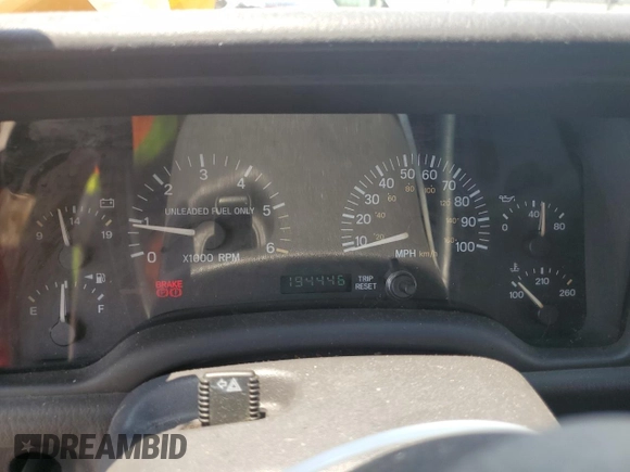 1999 Jeep Cherokee Sport with VIN 1J4FT68SXXL669549, listed as a Copart auction lot 62367015 with 194,446 mi miles and Salvage title. Bid and sale history available at DreamBid. Image 9.
