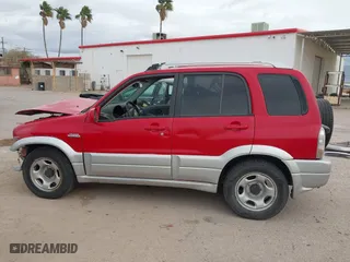 2004 Suzuki Grand Vitara with VIN JS3TE62V344100216, listed as a IAAI auction lot 41734638 with 213,166 mi miles. Bid and sale history available at carsss.com. Image 15.
