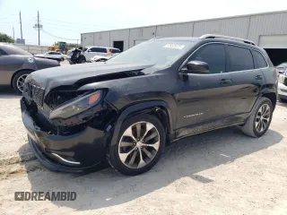 2019 Jeep Cherokee with VIN 1C4PJLJN0KD215834, listed as a Copart auction lot 57652975 with 127,986 mi miles and Clean title. Bid and sale history available at DreamBid. Image 1.