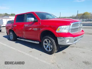 2016 Ram 1500 Laramie z VIN 1C6RR7NM1GS121871, wystawiony jako IAAI lot #41880791 z przebiegiem 188 128 mil mil oraz . Historia ofert i sprzedaży dostępna na DreamBid. Obrazek 1.