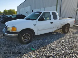 2004 Ford F-150 XL with VIN 2FTRX17W44CA46304, listed as a Copart auction lot 49446765 with 308,131 mi miles and Salvage title. Bid and sale history available at DreamBid. Image 1.