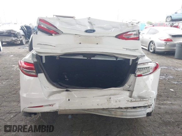 2019 Ford Fusion Titanium with VIN 3FA6P0K90KR236674, listed as a IAAI auction lot 42008633 with 99,737 mi miles and . Bid and sale history available at DreamBid. Image 16.