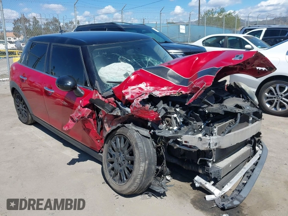 2017 MINI Hardtop 4 Door Cooper z VIN WMWXU1C57H2E18670, wystawiony jako IAAI lot #41950314 z przebiegiem 94 199 mil mil oraz . Historia ofert i sprzedaży dostępna na DreamBid. Obrazek 1.