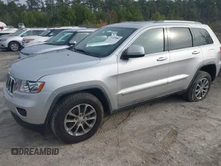 2012 Jeep Grand Cherokee Laredo with VIN 1C4RJFAG7CC189381, listed as a IAAI auction lot 41429085 with 137,238 mi miles. Bid and sale history available at carsss.com. Image 16.