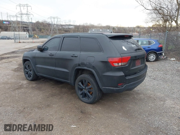 2013 Jeep Grand Cherokee Laredo with VIN 1C4RJEAG2DC573970, listed as a IAAI auction lot 41892914 with 185,050 mi miles. Bid and sale history available at carsss.com. Image 3.