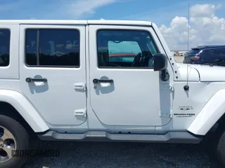 2018 Jeep Wrangler Unlimited Sahara with VIN 1C4BJWEG3JL805263, listed as a IAAI auction lot 42593276 with 96,489 mi miles and . Bid and sale history available at DreamBid. Image 13.
