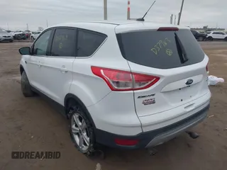 2014 Ford Escape SE with VIN 1FMCU9G93EUD37963, listed as a IAAI auction lot 41178797 with 171,149 mi miles and . Bid and sale history available at DreamBid. Image 3.