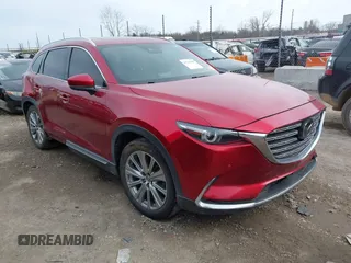 2021 Mazda CX-9 Signature with VIN JM3TCBEY0M0502938, listed as a IAAI auction lot 41734208 with 59,375 mi miles and . Bid and sale history available at carsss.com. Image 1.