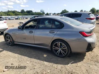 2023 BMW 3 Series 330e xDrive with VIN 3MW39FS02P8D01319, listed as a Copart auction lot 67836734 with 12,883 mi miles and Salvage Title. Bid and sale history available at carsss.com. Image 2.