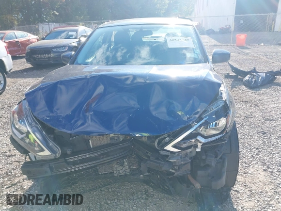 2019 Nissan Sentra S with VIN 3N1AB7AP9KY395472, listed as a IAAI auction lot 40544757 with 66,804 mi miles and . Bid and sale history available at DreamBid. Image 6.