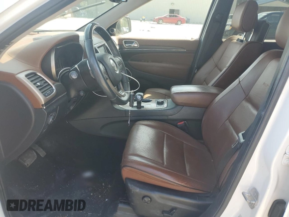 2015 Jeep Grand Cherokee Summit with VIN 1C4RJFJG3FC847797, listed as a Copart auction lot 54848085 with 53,506 mi miles and Salvage Title. Bid and sale history available at DreamBid. Image 7.