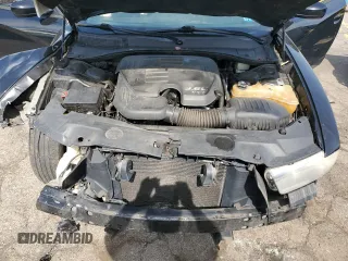 2013 Dodge Charger SE z VIN 2C3CDXBG6DH725726, wystawiony jako Copart lot #56415675 z przebiegiem 185 165 mil mil oraz Szkoda całkowita • Salvage title. Historia ofert i sprzedaży dostępna na DreamBid. Obrazek 11.