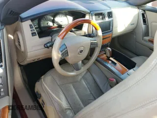 2008 Cadillac XLR z VIN 1G6YV36A685600464, wystawiony jako Copart lot #73890104 z przebiegiem Nie podano mil oraz Szkody całkowita. Historia ofert i sprzedaży dostępna na DreamBid. Obrazek 8.