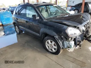 2005 Hyundai Tucson GLS with VIN KM8JN12D85U062222, listed as a Copart auction lot 77317334 with 192,758 mi miles and Salvage Title. Bid and sale history available at carsss.com. Image 4.