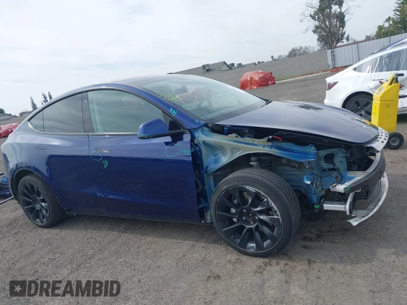 2021 Tesla Model Y Long Range with VIN 5YJYGAEE5MF199286, listed as a IAAI auction lot 41677915 with 52,500 mi miles. Bid and sale history available at carsss.com. Image 14.