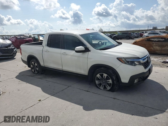 2017 Honda Ridgeline RTL with VIN 5FPYK2F53HB001434, listed as a Copart auction lot 58414335 with 187,711 mi miles and Salvage title. Bid and sale history available at DreamBid. Image 4.