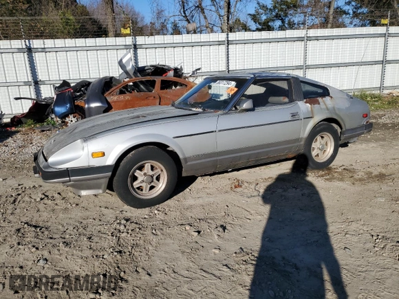1983 Datsun 280ZX z VIN JN1HZ04S6DX571982, wystawiony jako Copart lot #86317294 z przebiegiem Nie podano mil oraz Tytuł czysty. Historia ofert i sprzedaży dostępna na DreamBid. Obrazek 1.