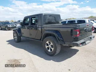 2021 Jeep Gladiator Willys with VIN 1C6HJTAG7ML523718, listed as a IAAI auction lot 42206058 with 48,071 mi miles and . Bid and sale history available at DreamBid. Image 3.