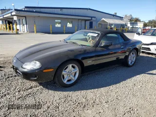 1997 Jaguar XK with VIN SAJGX2740VC011408, listed as a Copart auction lot 88175455 with 170,863 mi miles and Clean Title. Bid and sale history available at DreamBid. Image 1.