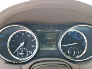 2012 Mercedes-Benz GL 450 z VIN 4JGBF7BE8CA774886, wystawiony jako Copart lot #51657035 z przebiegiem 185 844 mil mil oraz Szkoda całkowita • Salvage title. Historia ofert i sprzedaży dostępna na DreamBid. Obrazek 9.