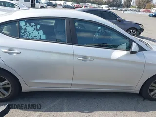 2018 Hyundai Elantra SEL z VIN 5NPD84LFXJH305253, wystawiony jako IAAI lot #42078772 z przebiegiem 122 065 mil mil oraz . Historia ofert i sprzedaży dostępna na DreamBid. Obrazek 14.