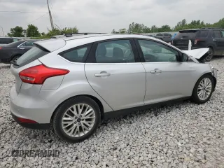 2017 Ford Focus Titanium with VIN 1FADP3N20HL320461, listed as a Copart auction lot 60292955 with 76,319 mi miles and Clean title. Bid and sale history available at DreamBid. Image 3.