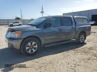2013 Nissan Titan SV with VIN 1N6BA0ED9DN309859, listed as a Copart auction lot 84078074 with 57,082 mi miles and Salvage title. Bid and sale history available at DreamBid. Image 1.