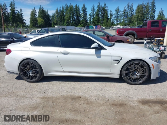 2015 BMW M4 with VIN WBS3R9C57FK331601, listed as a IAAI auction lot 42403644 with 78,794 mi miles and . Bid and sale history available at DreamBid. Image 14.