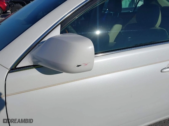 2005 Toyota Avalon XL with VIN 4T1BK36B25U031050, listed as a IAAI auction lot 41024010 with 203,336 mi miles. Bid and sale history available at carsss.com. Image 12.