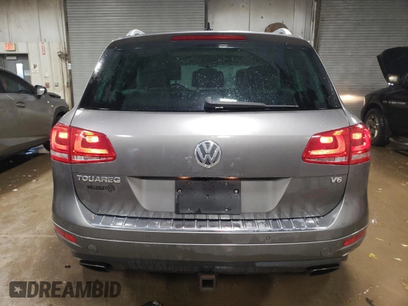 2013 Volkswagen Touareg Lux with VIN WVGEF9BP6DD002607, listed as a Copart auction lot 83420704 with 143,571 mi miles and Salvage Title. Bid and sale history available at DreamBid. Image 6.