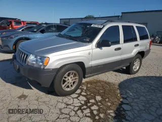 2004 Jeep Grand Cherokee Laredo with VIN 1J4GW48S94C425242, listed as a Copart auction lot 63118015 with 157,076 mi miles and Clean title. Bid and sale history available at DreamBid. Image 1.