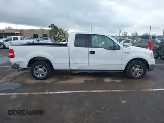 2004 Ford F-150 STX with VIN 1FTRX12W84NC29545, listed as a IAAI auction lot 41921712 with 304,891 mi miles. Bid and sale history available at carsss.com. Image 13.