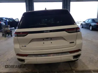 2022 Jeep Grand Cherokee Overland with VIN 1C4RJYD68N8716557, listed as a Copart auction lot 86807614 with 12,590 mi miles and Salvage title. Bid and sale history available at DreamBid. Image 6.