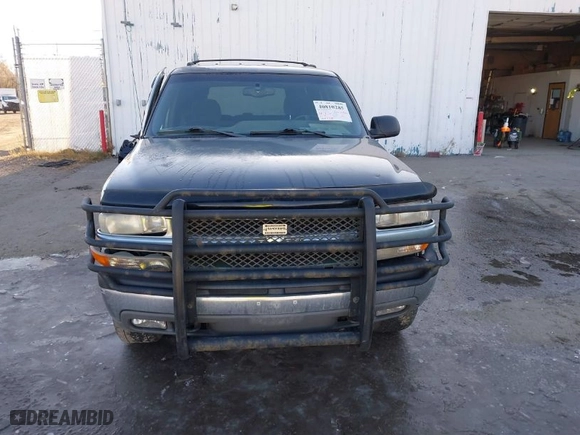 2002 Chevrolet Tahoe LS with VIN 1GNEK13V82J180328, listed as a IAAI auction lot 40810285 with 210,728 mi miles. Bid and sale history available at carsss.com. Image 12.