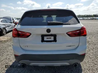 2018 BMW X1 sDrive28i with VIN WBXHU7C32J5L07666, listed as a Copart auction lot 54173465 with 132,514 mi miles and Clean Title. Bid and sale history available at DreamBid. Image 6.