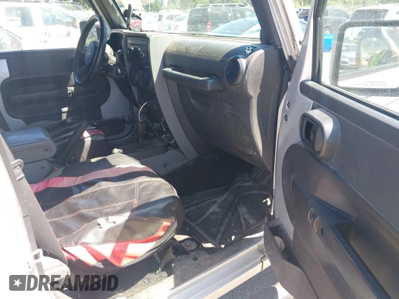 2008 Jeep Wrangler Unlimited X with VIN 1J4GA39148L596727, listed as a IAAI auction lot 42632457 with 175,000 mi miles and . Bid and sale history available at DreamBid. Image 5.