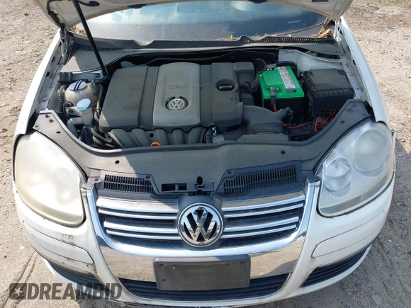 2007 Volkswagen Jetta 2.5 z VIN 3VWRG71K77M062978, wystawiony jako IAAI lot #42415517 z przebiegiem 168 159 mil mil oraz . Historia ofert i sprzedaży dostępna na DreamBid. Obrazek 10.