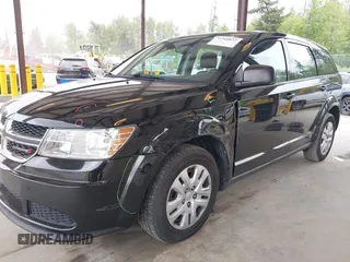 2013 Dodge Journey American Value with VIN 3C4PDCABXDT671589, listed as a IAAI auction lot 42260837 with 154,214 mi miles and . Bid and sale history available at DreamBid. Image 6.