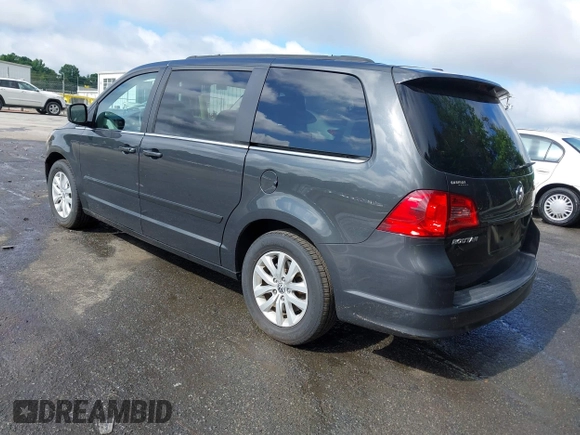 2012 Volkswagen Routan SE with VIN 2C4RVABG3CR293458, listed as a IAAI auction lot 42210411 with 139,390 mi miles and . Bid and sale history available at DreamBid. Image 3.