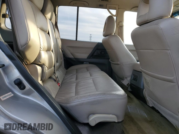 2002 Mitsubishi Montero Limited z VIN JA4MW51R12J020808, wystawiony jako Copart lot #41915255 z przebiegiem 127 834 mil mil oraz Czysty tytuł • Clean title. Historia ofert i sprzedaży dostępna na DreamBid. Obrazek 11.