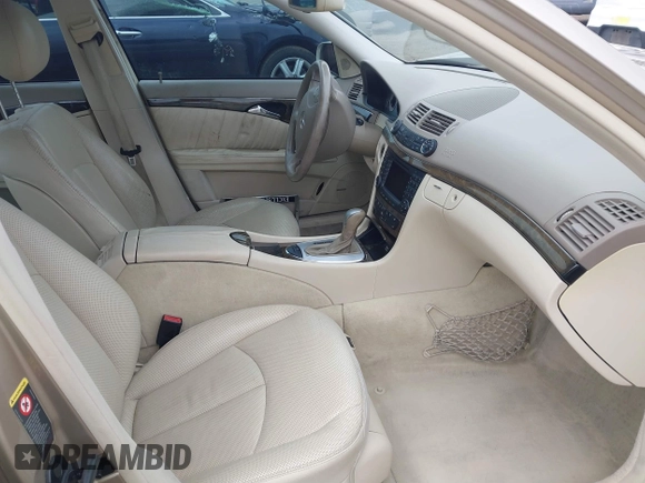 2005 Mercedes-Benz E-Class 3.2L with VIN WDBUF65J25A614469, listed as a IAAI auction lot 41521864 with 90,403 mi miles. Bid and sale history available at carsss.com. Image 5.